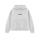 Hoodie oversize de felpa color gris claro, con capucha y bolsillo frontal tipo canguro. Presenta un bordado central en color negro con el texto 'venelo'.