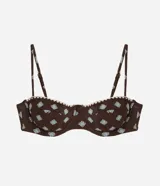 Top de bikini media copa con aro, confeccionado en poliamida con estampado Sunshine Icon de motivos geométricos celestes sobre fondo marrón, breteles finos regulables y detalle de costuras en contraste.