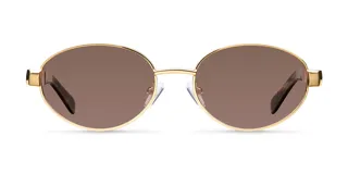 Lentes de sol con montura ovalada de acero inoxidable en color dorado y cristales polarizados en tono marrón. Presentan un diseño de puente fino y patillas con terminación en carey.