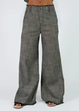 Pantalon de lino a rayas verticales de corte ancho y relajado, con cintura elastizada.