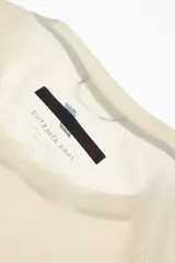Camiseta deportiva Ridar x Zara Athleticz color marrón, de cuello redondo y manga corta, confeccionada en tejido ligero y elástico con estructura perforada y tecnología de secado rápido.