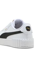 Championes Puma Carina 3.0, modelo deportivo para mujer en color blanco con franja lateral negra y suela de plataforma texturizada.