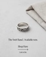 Anillo de plata 925 empavonado y giratorio, con diseño de olas en relieve.