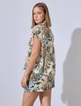 Short de lino estampado con motivos florales, pretina ancha elastizada y bolsillos inclinados en la parte delantera.