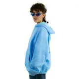 Canguro celeste oversize de felpa 80% algodón, con estampado de serigrafía tipo puf en la espalda con la palabra 'Sputnik' y 'Montevideo 2023'.