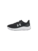 Championes de running Under Armour modelo Charged Pursuit 4, color negro con suela blanca. Presentan una parte superior de malla transpirable, acolchado en el tobillo y entresuela Charged Cushioning para mayor amortiguación y respuesta.