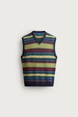 Chaleco regular fit de punto tejido en hilatura de lino, con diseño de patrones geométricos multicolor en tonos azul, verde, amarillo y rojo. Presenta cuello en V, manga sisa y acabados en rib. Colección especial Aaron Levine x Zara.