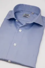 Camisa de vestir de manga larga Annoni modelo Hudson Collar, corte slim fit de color celeste con textura microzigzag y botones blancos.