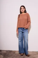 Sweater celeste de tejido de punto calado con lurex, de corte holgado y mangas largas.