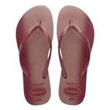 Sandalias tipo ojotas Havaianas modelo Slim Gloss, con diseño de glitter en la base y tiras finas con textura.