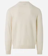 Buzo azul marino de algodón texturizado, con cuello redondo y mangas largas con puños ajustados.