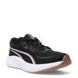 Championes de running Puma Skyrocket Lite 2 para mujer, en color negro con detalles en blanco y cobre. Presentan un diseño de malla transpirable, entresuela PUMALite para mayor amortiguación y plantilla SOFTFOAM+ para un confort superior. Cuentan con suela de goma de largo completo para una tracción óptima en superficies urbanas.