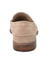 Mocasín de cuero color beige con detalle de antifaz y costuras en la puntera.