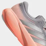 Championes de running Adidas Supernova Rise, con tecnología de amortiguación Dreamstrike+ en la mediasuela para una pisada suave y estable. Presentan un diseño en tonos naranja y gris, con exterior de tela y sintético, y suela de caucho.