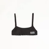 Top tipo bralette de denim lavado color marrón, con breteles finos, elástico en la espalda y bordado frontal con logo.
