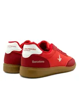 Championes deportivos para mujer Santa Barbara modelo Chillw, de color azul marino con suela de goma marrón y detalles en blanco.