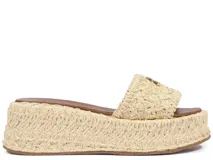 Sandalias de plataforma Schutz forradas en yute, estilo chunky, con tira ancha en el empeine y detalle de aplique metálico dorado.