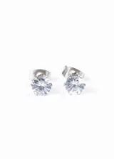 Par de caravanas con brillo de 6mm de diámetro, hechas de acero quirúrgico hipoalergénico y strass.