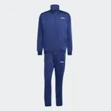 Conjunto deportivo Adidas de dos piezas, campera y pantalón, en color azul. Campera de cuello alto con cierre frontal completo y bolsillos laterales, y pantalón con cintura elástica con cordón ajustable y bolsillos laterales.