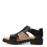 Sandalias de cuero combinadas en color negro y beige, con diseño de tiras anchas, suela track dentada y detalle de costuras decorativas.