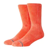 Medias Stance modelo Icon Dyed Crew, de caña media, color naranja, con diseño acanalado en la parte superior y amortiguación estratégica.