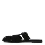 Sandalias planas Miss Carol Bruna de color negro, con diseño tipo romano de tiras cruzadas, hebilla metálica de ajuste lateral y pequeños detalles de tachas.