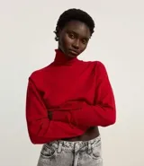 Blusa básica de punto marca Blue Steel, con cuello alto y manga larga. Confeccionada en tejido de punto recto con textura suave y cómoda.