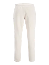 Pantalon de buzo color beige, corte recto, confeccionado en tejido de algodón con cintura elastizada.