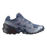 Championes de trail running Salomon Speedcross 6, color azul con suela negra contagrip y detalles geométricos en el lateral.