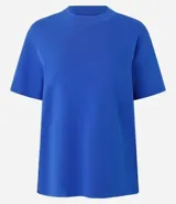 Remera básica Marfinno de cuello redondo y manga corta, confeccionada en algodón peruano con acabado suedine.