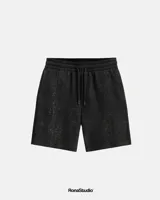 Bermuda negra de algodón premium con efecto stone wash, corte recto y cintura con cordón ajustable.