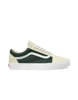 Championes Vans modelo Old Skool, con diseño bicolor en verde oscuro y crema. Presentan la icónica banda lateral blanca, cordones al tono y suela de goma vulcanizada.
