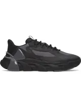 Championes Under Armour UA HB Trainer Sport, color negro con detalles en gris, diseño técnico con malla transpirable y suela esculpida.