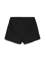 Pollera short de tiro alto y fit holgado, con diseño envolvente en la parte delantera y cierre lateral invisible.