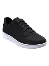 Championes Under Armour modelo W Tempo, de diseño inspirado en el baloncesto con parte superior de cuero suave en color negro y entresuela de espuma blanca.