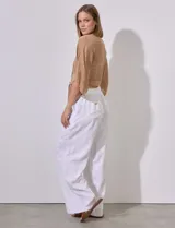 Bolero calado negro de poliéster con mangas 3/4 y frente abierto con lazo.