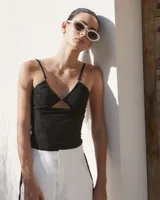 Aros colgantes con forma irregular, realizados en bronce y alpaca, con pernos y cierres mariposa de plata 925.