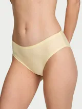 Panty bikini Body by Victoria Flex color amarillo claro, confeccionada en microfibra supersuave con diseño de talle medio y acabado sin costuras termoselladas.