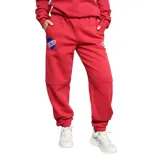 Pantalón de jogging bordó con cintura elástica y escudo del Club Nacional de Football en la pierna izquierda.