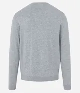 Suéter de punto color borgoña, con cuello redondo, sisas ligeramente desplazadas y bajo y puños acanalados.