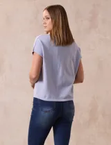 Buzo tejido color blanco, marca Ninety. Escote en V. Calado en escote y delantera.