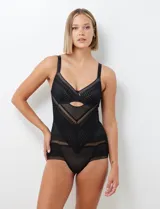 Body negro de gasa texturada con diseño geométrico, sin aro. Breteles fijos regulables y broche trasero con tres posiciones.