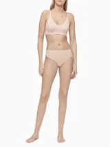 Colaless color piel de microfibra elástica con cintura alta sin costuras y logo de Calvin Klein en la parte delantera.