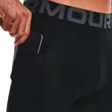 Calza 3/4 Under Armour HeatGear Armor negra, de compresión, con cintura elástica con logo y tecnología HeatGear.