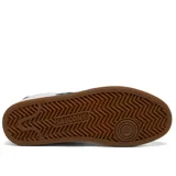 Championes Saucony Jazz Court de cuero blanco con detalles en verde oscuro, suela de goma color caramelo y logo lateral con perforaciones.