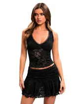 Minifalda negra de encaje elastizado con volados.