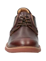 Zapato casual de cuero lustrado color marrón, con cordones y suela de EVA con tecnología Honey Foam para mayor amortiguación y flexibilidad.