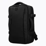 Mochila Merrell expandible de diseño técnico, color negro, con capacidad ajustable de 26 a 38 litros. Presenta múltiples compartimentos con cierres, correas de compresión laterales y asa lateral reforzada para uso versátil.