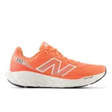 Championes de running New Balance 880 V14, color naranja con detalles en blanco y negro.