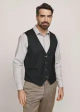 Chaleco reversible Due Volti de corte sastrero, con diseño a cuadros en tonos de gris y cierre frontal con cuatro botones oscuros.